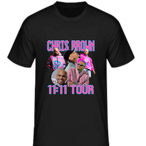 May include: Black t-shirt with a graphic of Chris Brown in a collage of images. The text "Chris Brown" and "11:11 Tour" is printed in pink and blue.