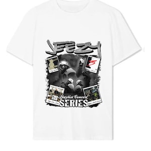 May include: White t-shirt with a black and white graphic print of a rapper wearing a hat and sunglasses. The graphic includes the text "Yeezy Playlist Concert Series".