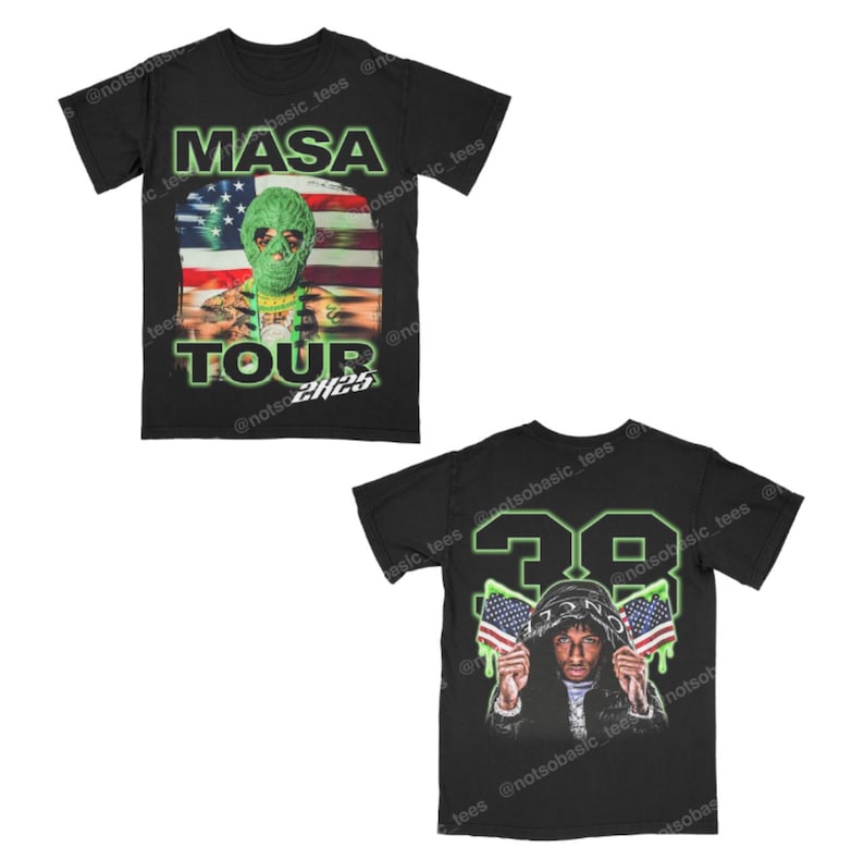 May include: Black t-shirts with graphic designs. One shirt features the text "MASA TOUR 2425" with an alien-like figure and an American flag. The other shirt displays the number "38" and a person holding American flags.