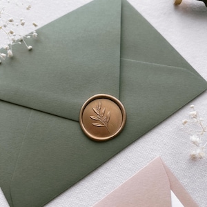 leaf branch design gold wax seal on olive green thank you card envelope