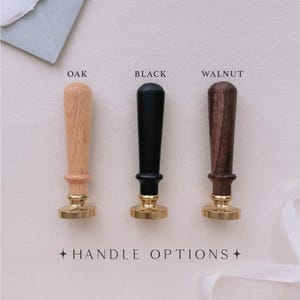 Wax seal stamps showcasing three wooden handle color options