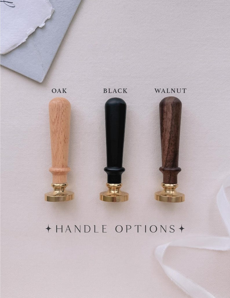 Wax seal stamps showcasing three wooden handle color options