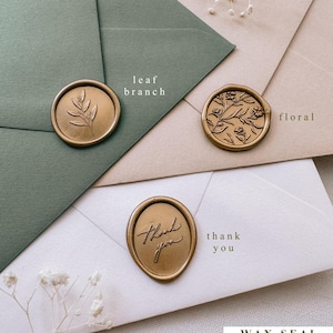 gold wax seals featuring designs of leaf branch, flower, and the phrase thank you, on olive green, beige, and white envelopes