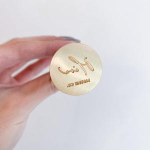 Custom wax seal stamp head for Olive Paperie Co logo