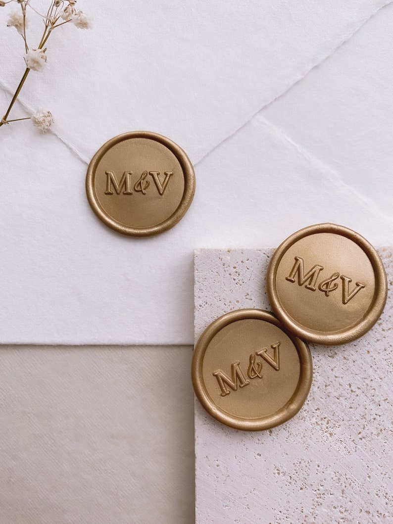 Modern typeface monogram round wax seal stickers in gold