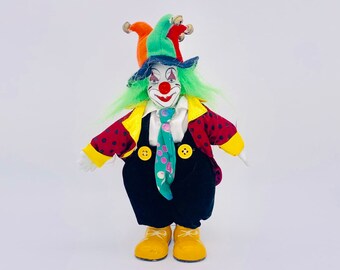 small but knowing clown doll