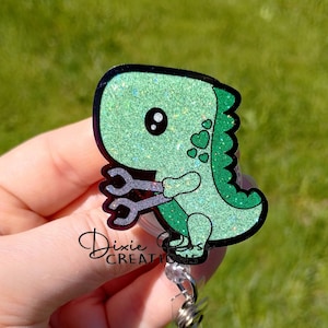 Boy Dino with Arm Extenders Interchangeable Retractable Badge Reel