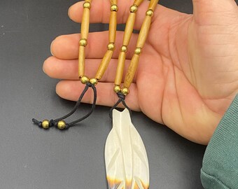 Real Bone feather necklace. powwow regalia. Native American jewelry made with Bone hairpipe and Brass beads and cord