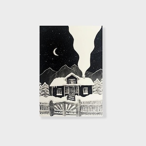Maison de carte postale dans la neige