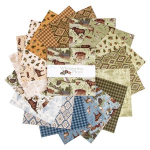 May include: A stack of square fabric swatches arranged in a fan shape, featuring various patterns including woodland animals, cabins, pine cones, plaid, and geometric designs in shades of green, brown, blue, and cream, with a central band labeled Whispering Pines.