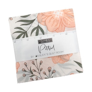 May include: A stack of fabric squares with a floral pattern. The fabric features large peach-colored flowers, green leaves, and small sprigs on a white background. A white band with the word "Potted" and the brand name is wrapped around the fabric squares.