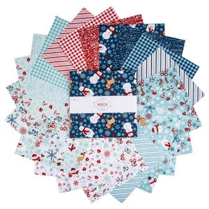 May include: A stack of square fabric swatches arranged in a fan pattern, featuring various winter-themed prints including snowmen, reindeer, snowflakes, stripes, and plaid in red, white, and blue. A central paper band displays the text WINTER.