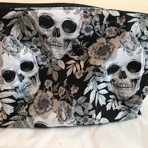 Large Skull themed makeup organiser bag with skull and crossbones charm zip pull