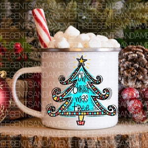 May include: White ceramic mug with a blue and red Christmas tree design. The tree has the words "Oh Christ mas tree" written on it. The mug is filled with marshmallows and a red and white candy cane.
