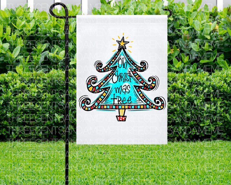 May include: A white garden flag featuring a blue and red Christmas tree design. The tree has the words "Oh Christ mas tree" written on it.