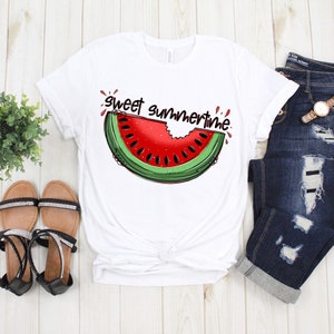 May include: White t-shirt with a watermelon graphic and the text "sweet summertime".