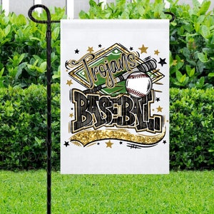 May include: A white garden flag with a green baseball diamond, a baseball bat, and a baseball. The text "Trojans Baseball" is written in black and gold letters with gold glitter.