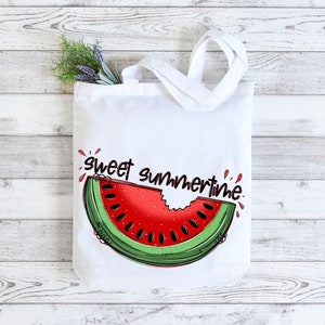 May include: White tote bag with a red and green watermelon slice graphic and the text "sweet summertime".
