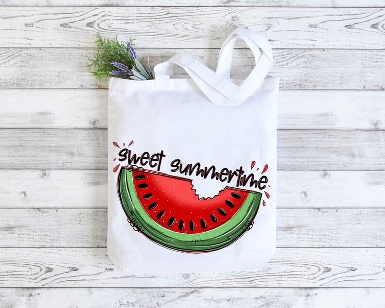 May include: White tote bag with a red and green watermelon slice graphic and the text "sweet summertime".