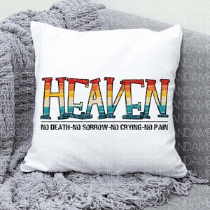 May include: White throw pillow with the word "HEAVEN" in rainbow colors with a vintage style font. The text "NO DEATH-NO SORROW-NO CRYING-NO PAIN" is printed below the word "HEAVEN".