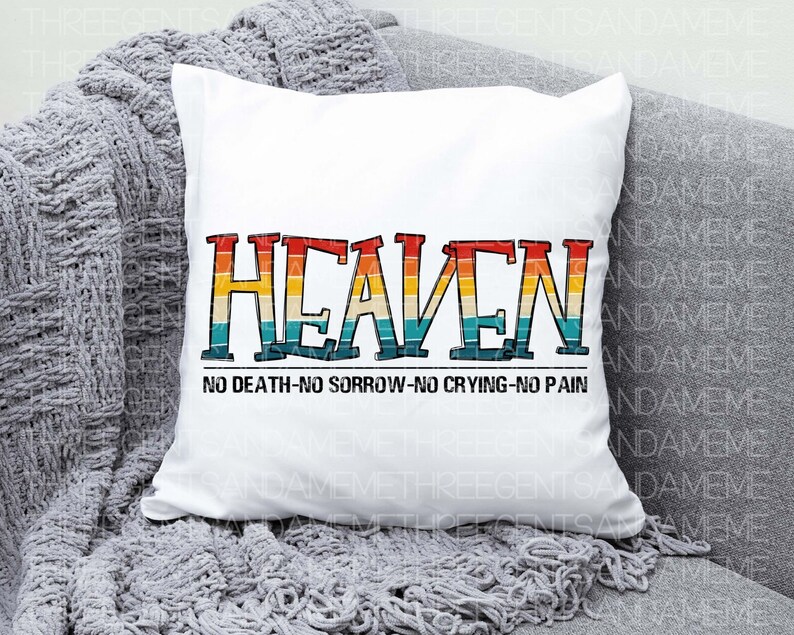 May include: White throw pillow with the word "HEAVEN" in rainbow colors with a vintage style font. The text "NO DEATH-NO SORROW-NO CRYING-NO PAIN" is printed below the word "HEAVEN".