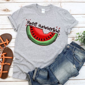 May include: Gray t-shirt with a watermelon graphic and the text "sweet summertime".
