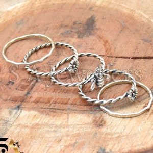 Anillos apilables de plata de ley: joyería artesanal con abejas y flores