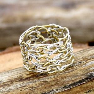 Handgemaakte sterlingzilveren brassbandring: tweekleurige boho-statementring