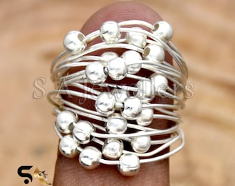 Handmade Sterling Silver Wraparound Ring: Multi-Layered Ball Design