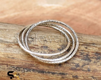 Anello intrecciato shop tre ori