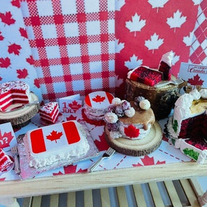Maßstab 1:12 Puppenhaus Miniatur Kuchen Puppenhaus Küche Essen Accessoire Dessert Kanada Tag Kanadier Amerika kariert Tiere Timbits Ahornsirup