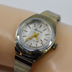 Lucerne gold tone womens mechanical, wind up , vintage watch