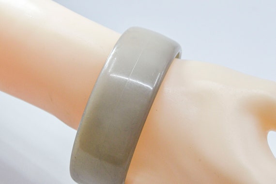 Grey tone womens plastic bangle bracelet - image 1