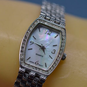Silver tone with mop dial, womens, fashion watch