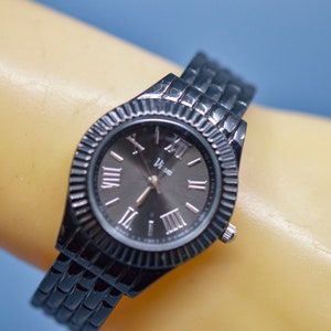 Dark tone, womens cuff watch