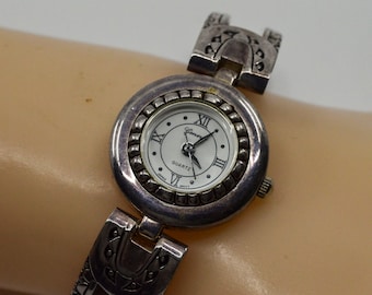 Silver tone with white dial and brown bracelet womens watch