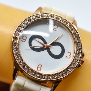 Gold tone with white dial, womens fashion watch