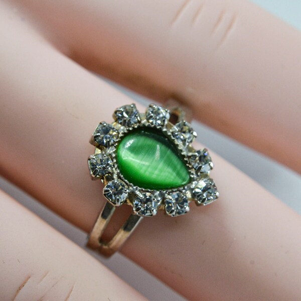 Silver tone with green and colorless crystals womens adjustable ring, size 6 1/4