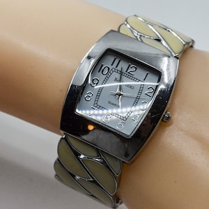 Silver tone with white dial womens cuff watch