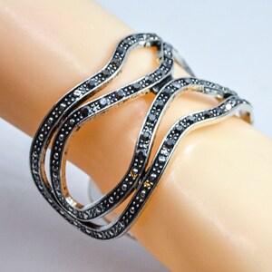 Silver tone with crystals womens cuff bracelet