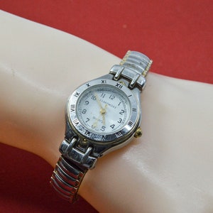 Two tone womens watch on stretch bracelet