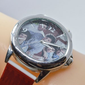 1D red and black tone womens, mans fashion wrist watch