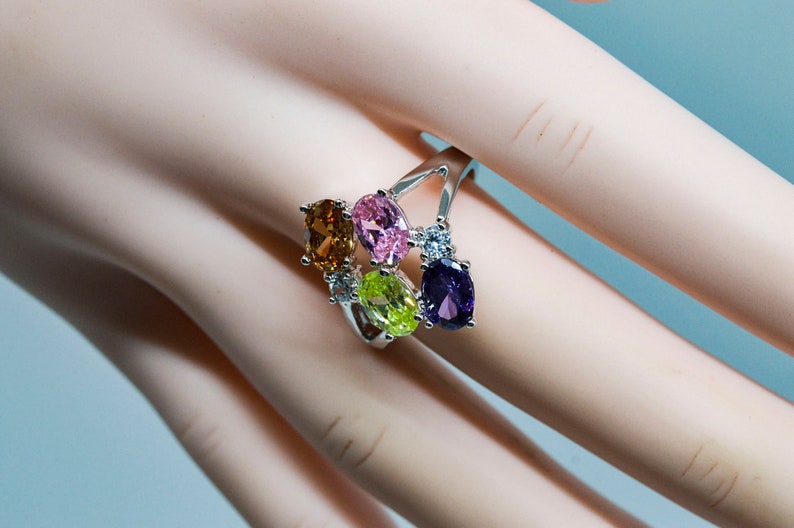 Size 7 12 Silver tone with multi color crystals womens ring 8 14