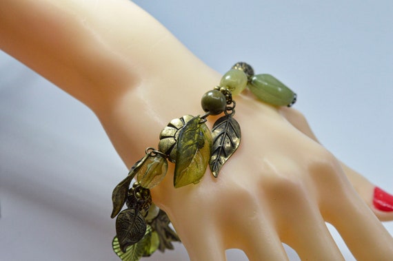 Green tone womens beaded bracelet - image 1