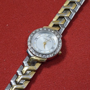 Liz Claiborne gold tone with crystals womens watch