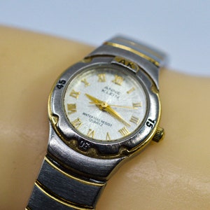 Anne Klein Stahl und Goldton, Damenuhr