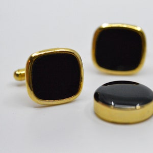Pair gold tone with blackmens vintage cuff links