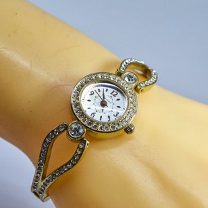 Gold tone with crystals womens fashion watch