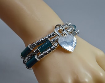Liz Claiborne silver  and blue tone womens stretch bracelet