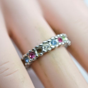 Silver tone with multi color crystals, womens ring,size 6 1/4